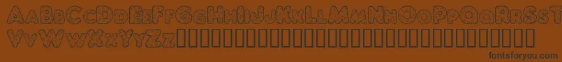 ChubbyDotty Font – Black Fonts on Brown Background