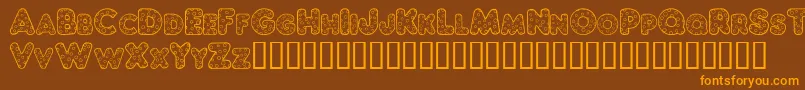 ChubbyDotty-Schriftart – Orangefarbene Schriften auf braunem Hintergrund