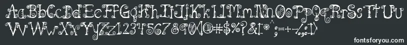 フォントSpahrtyg – 黒い背景に白い文字