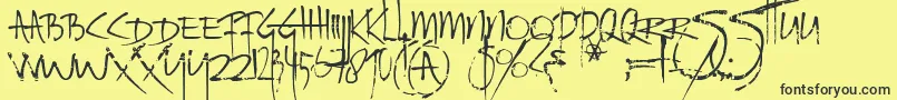 Шрифт Ratinfestedmailbox – чёрные шрифты на жёлтом фоне
