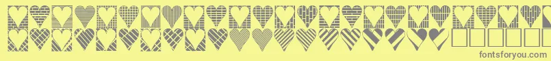 フォントHeartthings3 – 黄色の背景に灰色の文字