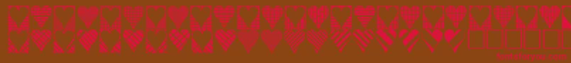 フォントHeartthings3 – 赤い文字が茶色の背景にあります。