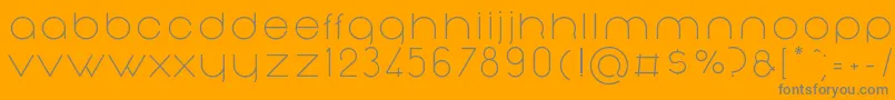 NonchalanceRegular-fontti – harmaat kirjasimet oranssilla taustalla
