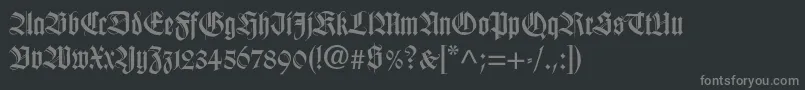 Wilhelmklingsporgotisch-Schriftart – Graue Schriften auf schwarzem Hintergrund