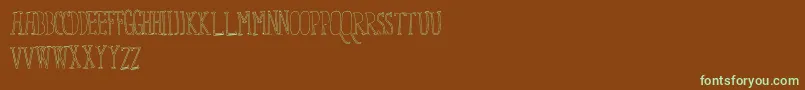 フォントFixYou – 緑色の文字が茶色の背景にあります。