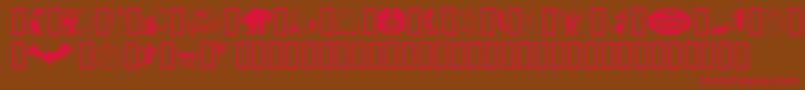 フォントKiddyhalloween – 赤い文字が茶色の背景にあります。
