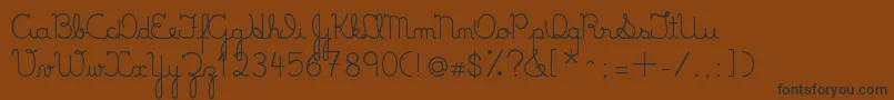 フォントLumenFull – 黒い文字が茶色の背景にあります