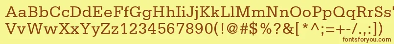 フォントCentricSsi – 茶色の文字が黄色の背景にあります。