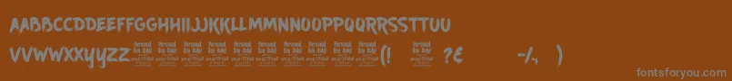 AncherrPersonalUse-Schriftart – Graue Schriften auf braunem Hintergrund