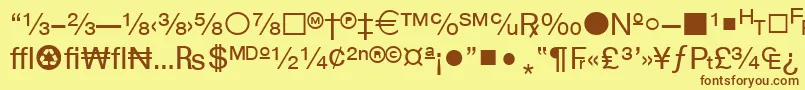 フォントWphv04n – 茶色の文字が黄色の背景にあります。