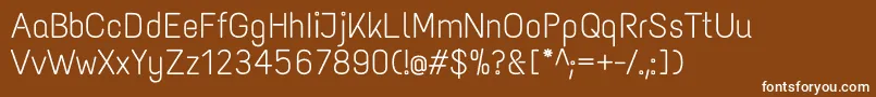 Fonte TextmeoneRegular – fontes brancas em um fundo marrom