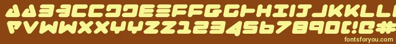 Zealotei-fontti – keltaiset fontit ruskealla taustalla