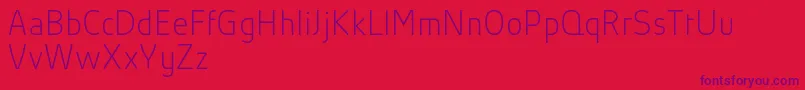 AbsolutProThinReduced Font – Purple Fonts on Red Background