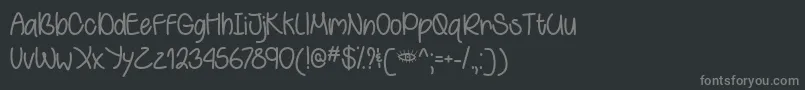 Czcionka BehindGreenEyesOtf – szare czcionki na czarnym tle