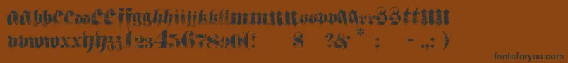 Hardcorium-Schriftart – Schwarze Schriften auf braunem Hintergrund