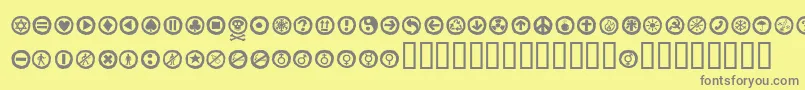 Alesignswhitell-fontti – harmaat kirjasimet keltaisella taustalla