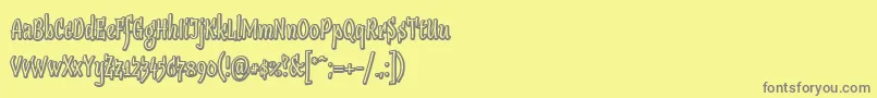 Fonte Sudegnakno2 – fontes cinzas em um fundo amarelo