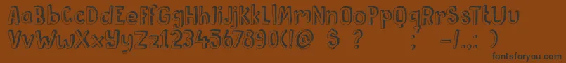 DkPusekatt Font – Black Fonts on Brown Background