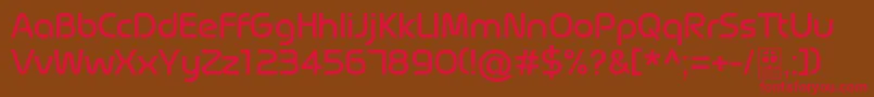 フォントMagettasRegularDemo – 赤い文字が茶色の背景にあります。