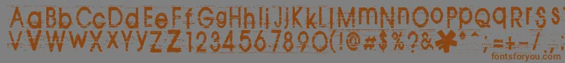Czcionka TomViolence – brązowe czcionki na szarym tle