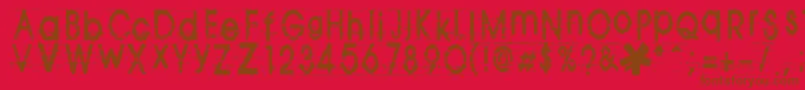 TomViolence-Schriftart – Braune Schriften auf rotem Hintergrund