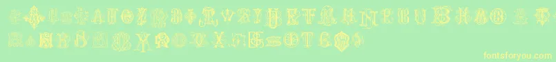 IntellectaMonogramsRandomSamples Font – Yellow Fonts on Green Background