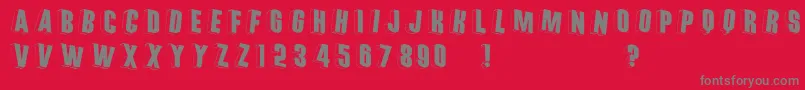 フォントThreedimrightwards – 赤い背景に灰色の文字