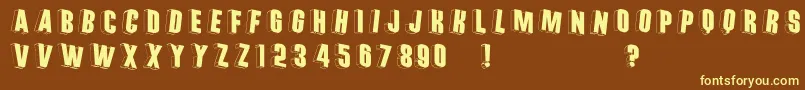 Threedimrightwards-fontti – keltaiset fontit ruskealla taustalla