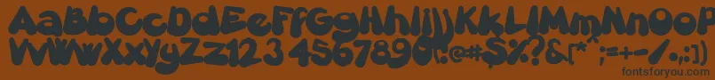 Gretoon Font – Black Fonts on Brown Background