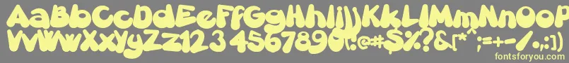 Gretoon Font – Yellow Fonts on Gray Background