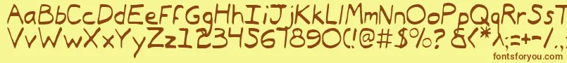 フォントTypeecanoeLight – 茶色の文字が黄色の背景にあります。