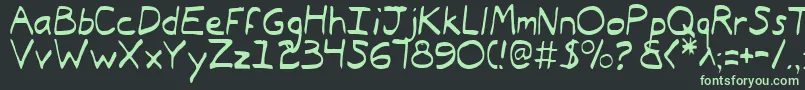 フォントTypeecanoeLight – 黒い背景に緑の文字