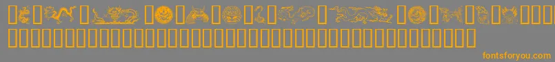 フォントDragons – オレンジの文字は灰色の背景にあります。