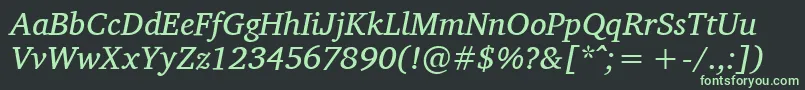 CharisSilItalic-fontti – vihreät fontit mustalla taustalla