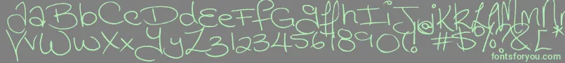 Megaink Font – Green Fonts on Gray Background