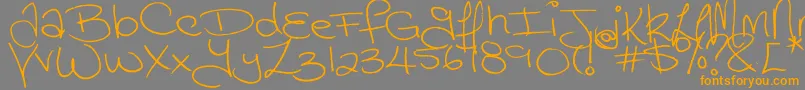 Megaink Font – Orange Fonts on Gray Background