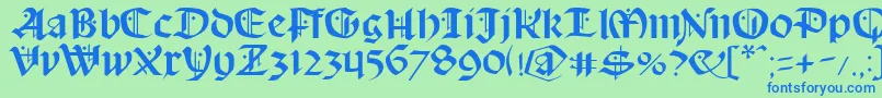 Schampel-Schriftart – Blaue Schriften auf grünem Hintergrund