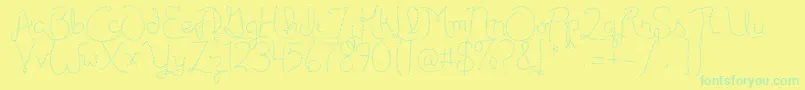 Publicitebasic-Schriftart – Grüne Schriften auf gelbem Hintergrund