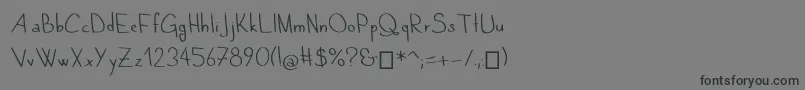 QuandTuDors Font – Black Fonts on Gray Background