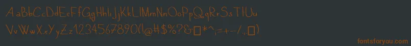 QuandTuDors-Schriftart – Braune Schriften auf schwarzem Hintergrund