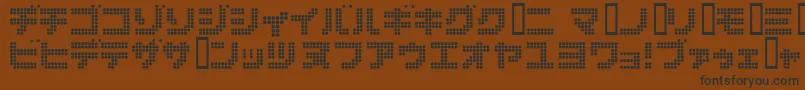 Dot6282k-fontti – mustat fontit ruskealla taustalla