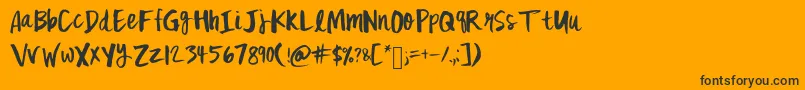 Więcej informacji o czcionce Mixfickle Czcionka Mixfickle – czarne czcionki na pomarańczowym tle