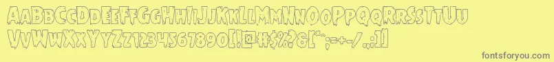 Mrsmonsterout-fontti – harmaat kirjasimet keltaisella taustalla