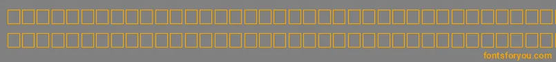 フォントBaasem – オレンジの文字は灰色の背景にあります。