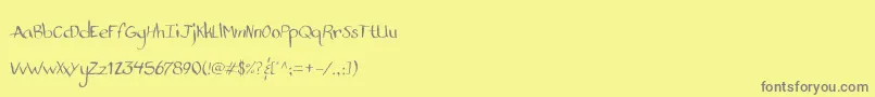 StandardNibHandwritten-Schriftart – Graue Schriften auf gelbem Hintergrund