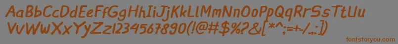IngatRegularItalic-fontti – ruskeat fontit harmaalla taustalla
