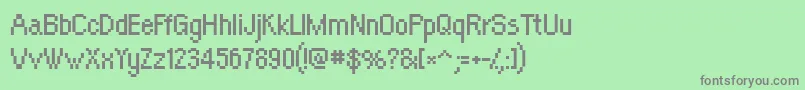 OrangeKid Font – Gray Fonts on Green Background