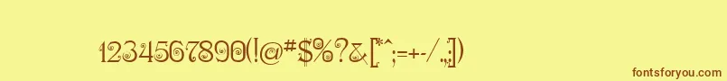 フォントNymphaOne – 茶色の文字が黄色の背景にあります。