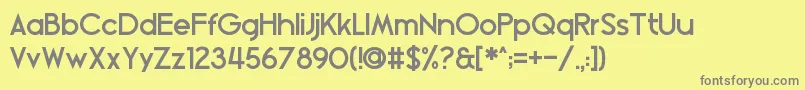 フォントBlissfulthinking – 黄色の背景に灰色の文字