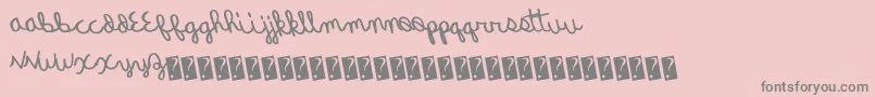 Quickrodeo-Schriftart – Graue Schriften auf rosa Hintergrund